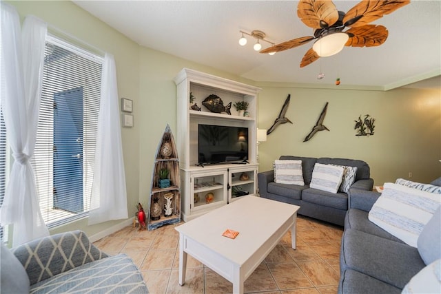 living room featuring light tile patterned flooring and ceiling fan