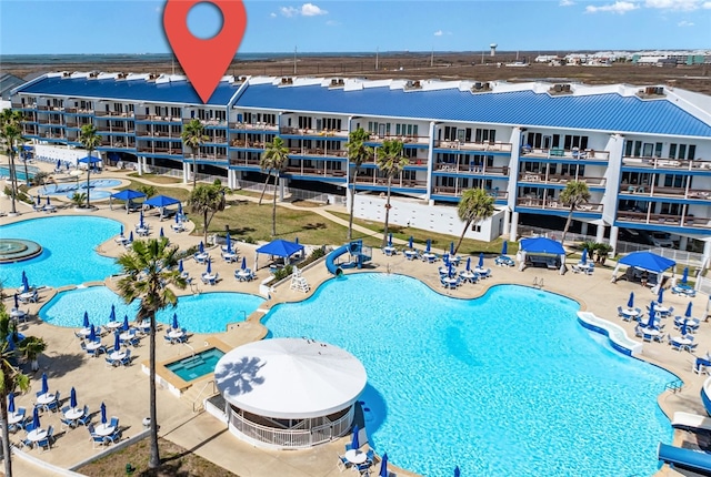 community pool featuring a patio area