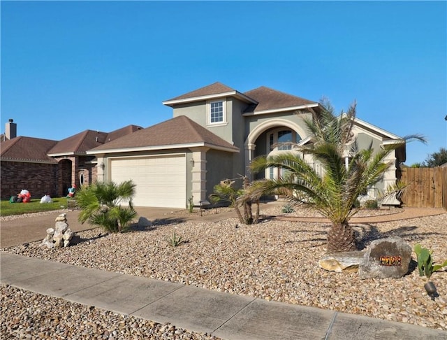 view of front of property featuring a garage