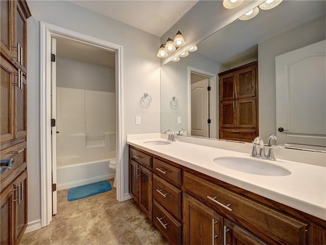 full bathroom with vanity, toilet, and tub / shower combination