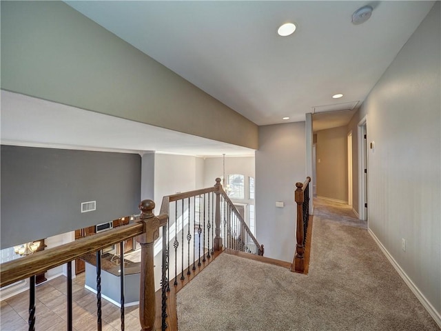 hallway with carpet floors