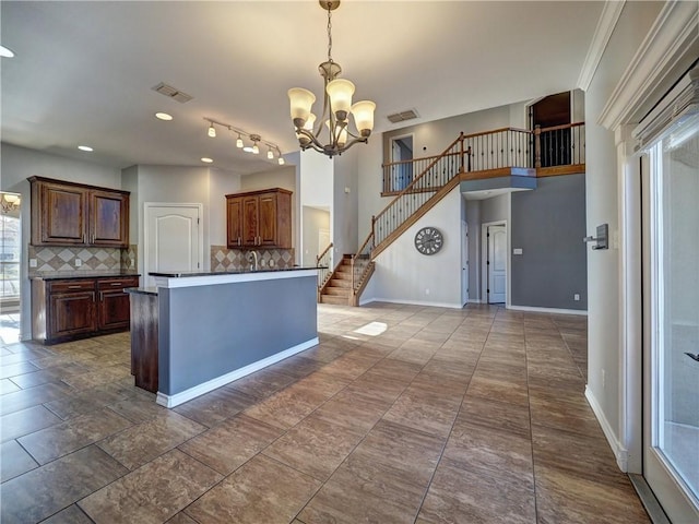 6738 Central Park, Corpus Christi, TX 78414 - kitchen featuring dark countertops, a chandelier, decorative backsplash, decorative light fixtures, and recessed lighting