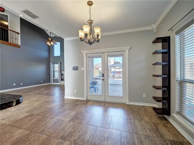 doorway to outside with ceiling fan with notable chandelier, lofted ceiling, crown molding, and french doors