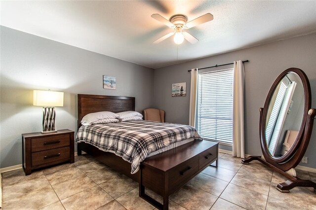 4009 Rooney Dr, Corpus Christi, TX 78413 - bedroom featuring light tile patterned flooring, baseboards, and ceiling fan