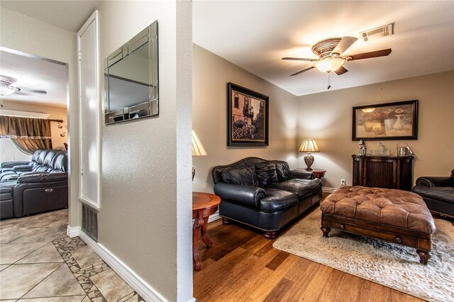 4009 Rooney Dr, Corpus Christi, TX 78413 - living area featuring ceiling fan, wood finished floors, and baseboards