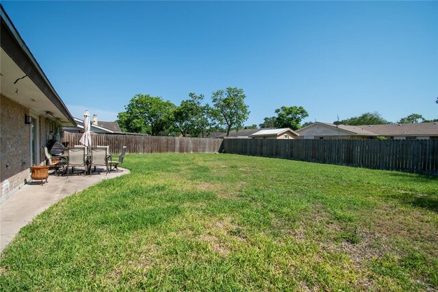 4009 Rooney Dr, Corpus Christi, TX 78413 - view of yard with a patio area
