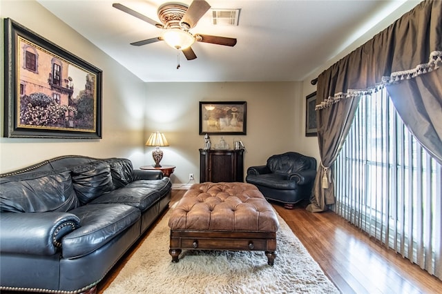 4009 Rooney Dr, Corpus Christi, TX 78413 - living room with wood finished floors and ceiling fan