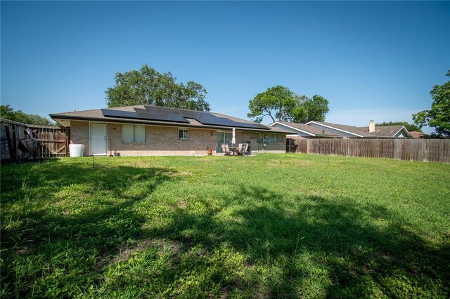 4009 Rooney Dr, Corpus Christi, TX 78413 - back of house with solar panels