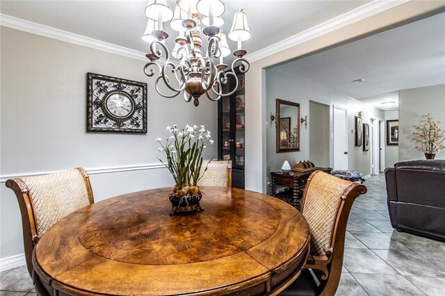 4009 Rooney Dr, Corpus Christi, TX 78413 - tiled dining space featuring a chandelier and crown molding