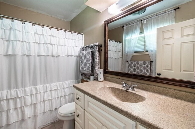 4009 Rooney Dr, Corpus Christi, TX 78413 - bathroom with vanity, toilet, a shower with shower curtain, and tile patterned floors