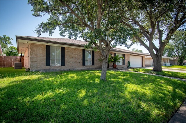 4009 Rooney Dr, Corpus Christi, TX 78413 - ranch-style home featuring a garage, brick siding, and central air condition unit