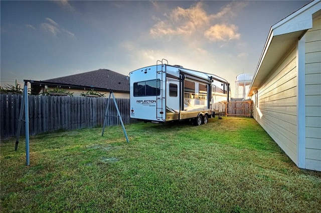 view of yard with a fenced backyard