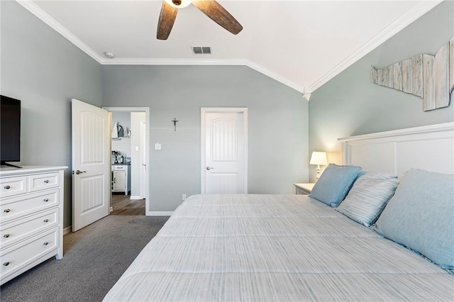 bedroom featuring visible vents, carpet flooring, lofted ceiling, and ornamental molding