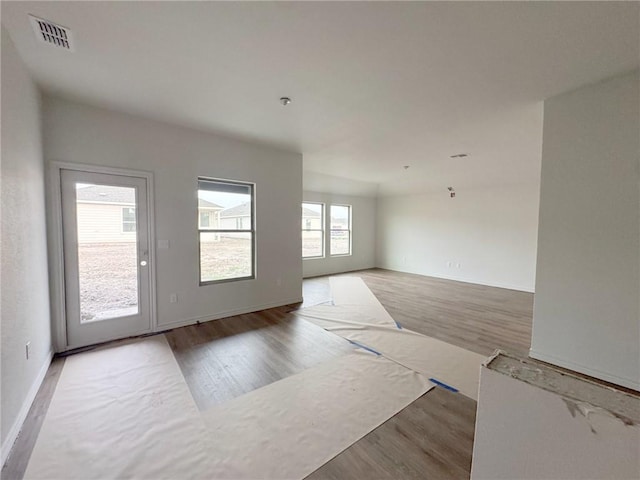 2689 Westeros St, Corpus Christi, TX 78415 - empty room with wood finished floors and visible vents