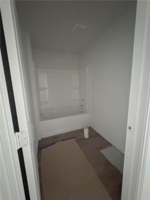 2689 Westeros St, Corpus Christi, TX 78415 - bathroom featuring washtub / shower combination and wood finished floors