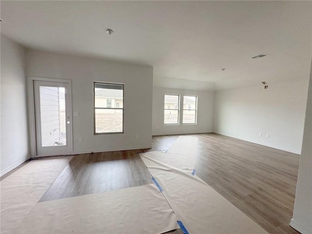 2689 Westeros St, Corpus Christi, TX 78415 - spare room featuring visible vents, baseboards, and wood finished floors