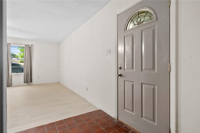3265 W Susan Cir, Ingleside, TX 78362 - foyer entrance with dark tile patterned flooring