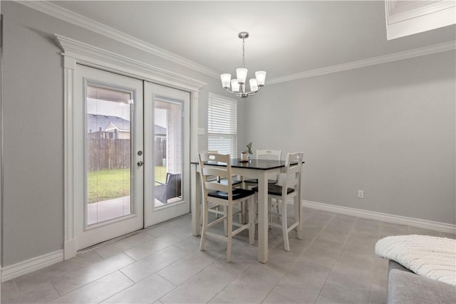 1501 Days End Dr, Corpus Christi, TX 78417 - dining room featuring french doors, a chandelier, ornamental molding, and light tile patterned floors