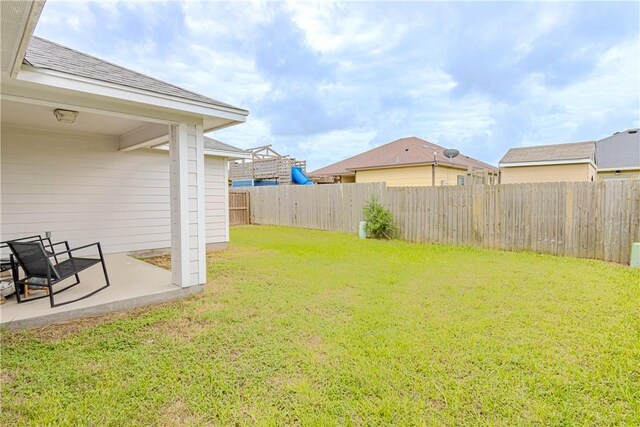 1501 Days End Dr, Corpus Christi, TX 78417 - fenced backyard featuring a patio area
