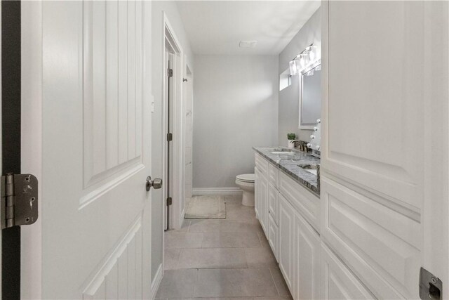 1501 Days End Dr, Corpus Christi, TX 78417 - bathroom featuring double vanity and tile patterned floors