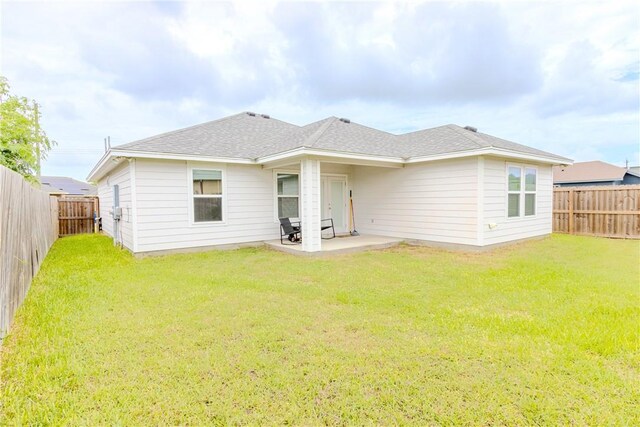 1501 Days End Dr, Corpus Christi, TX 78417 - rear view of house with a fenced backyard and a patio