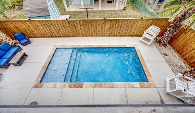 1227 S Magnolia St, Rockport, TX 78382 - view of swimming pool with a fenced backyard and a patio