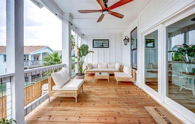 1227 S Magnolia St, Rockport, TX 78382 - sunroom / solarium with a healthy amount of sunlight and ceiling fan