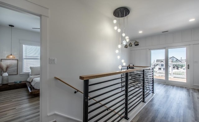 1227 S Magnolia St, Rockport, TX 78382 - staircase featuring recessed lighting, visible vents, and wood finished floors