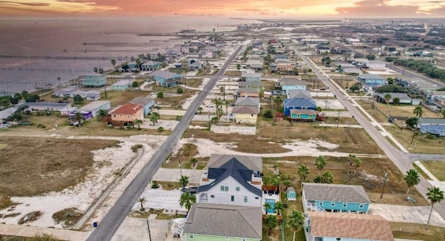 1227 S Magnolia St, Rockport, TX 78382 - aerial view at dusk featuring a residential view