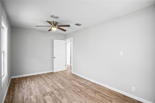 2630 Lynch St, Corpus Christi, TX 78404 - unfurnished room featuring ceiling fan, wood finished floors, and baseboards