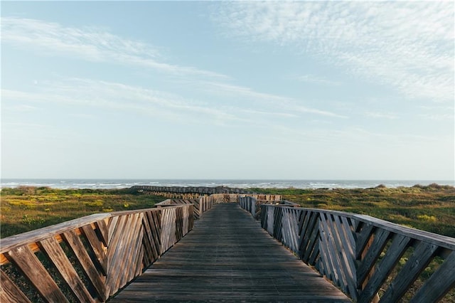 view of home's community with a water view