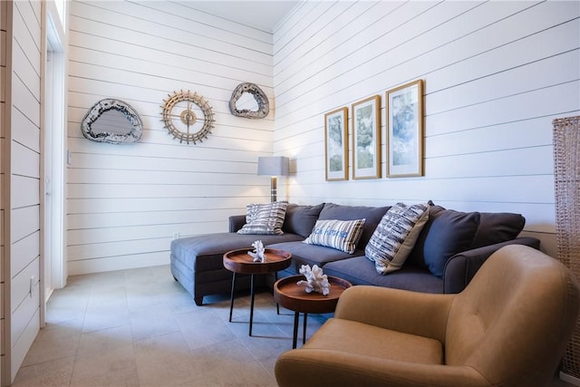 living room with wooden walls