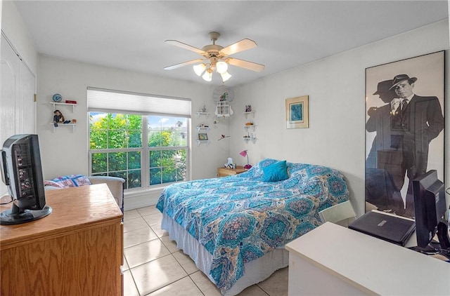 15426 Cuttysark St, Corpus Christi, TX 78418 - bedroom with light tile patterned floors and ceiling fan