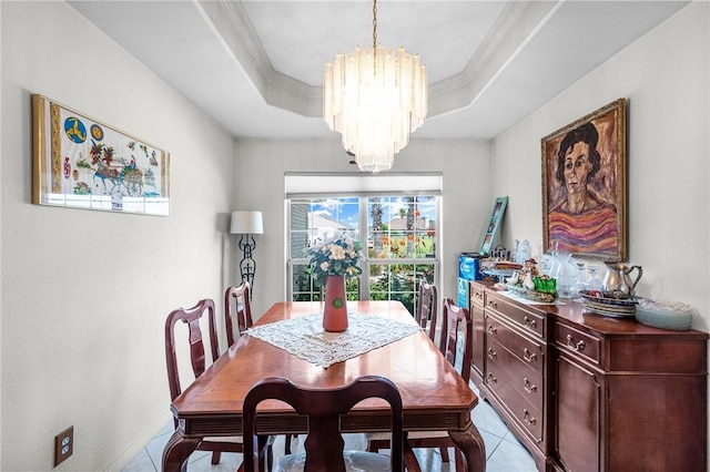 15426 Cuttysark St, Corpus Christi, TX 78418 - dining area with a chandelier, light tile patterned flooring, ornamental molding, and a tray ceiling