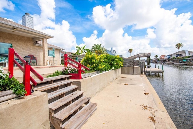 15426 Cuttysark St, Corpus Christi, TX 78418 - view of patio featuring a water view and a boat dock