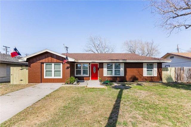 single story home featuring brick siding, board and batten siding, a front lawn, and fence