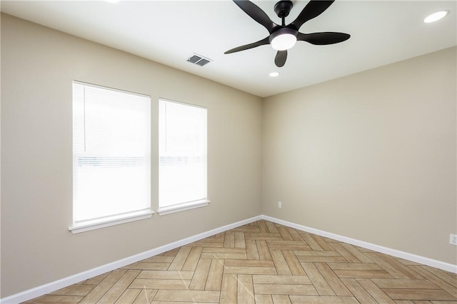 unfurnished room with a ceiling fan, recessed lighting, baseboards, and visible vents