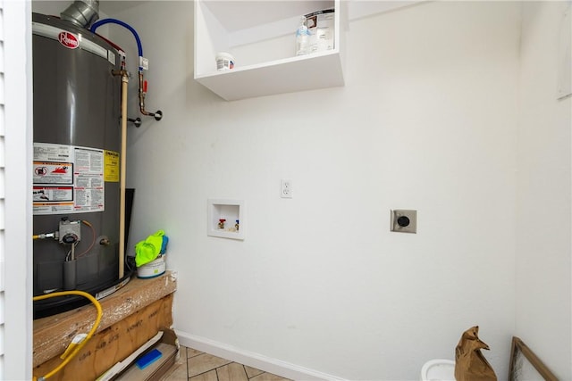 washroom featuring washer hookup, water heater, baseboards, hookup for an electric dryer, and laundry area