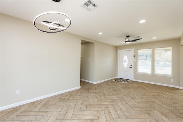 entryway with ceiling fan with notable chandelier, recessed lighting, baseboards, and visible vents