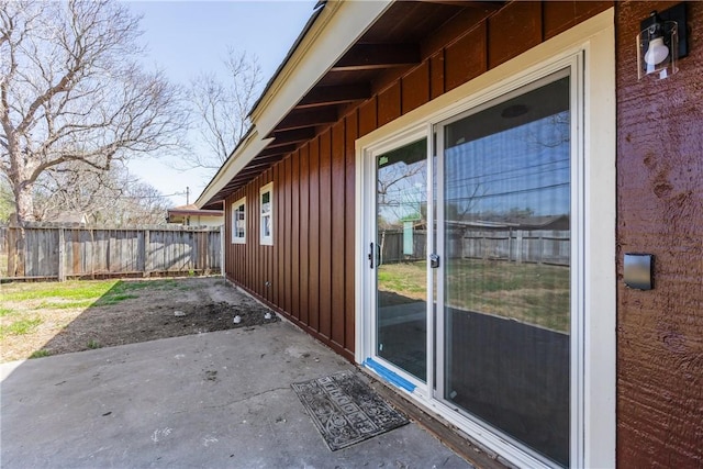 view of patio / terrace featuring fence