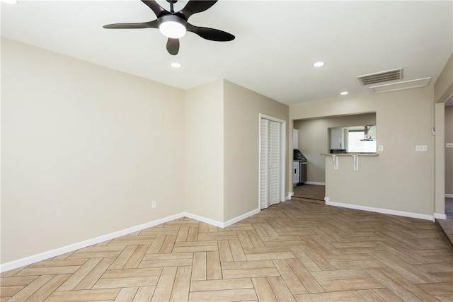 empty room featuring recessed lighting, baseboards, visible vents, and ceiling fan