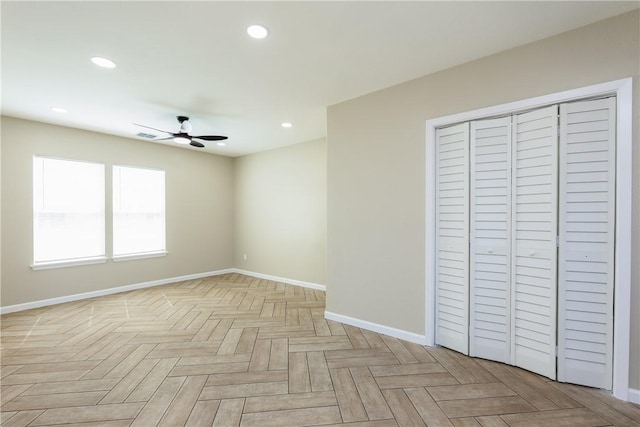 interior space with recessed lighting, baseboards, and a ceiling fan