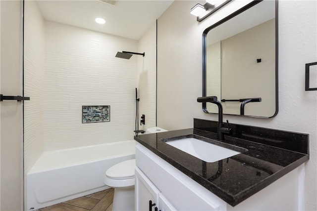 bathroom featuring tile patterned floors, toilet, recessed lighting, shower / bath combination, and vanity