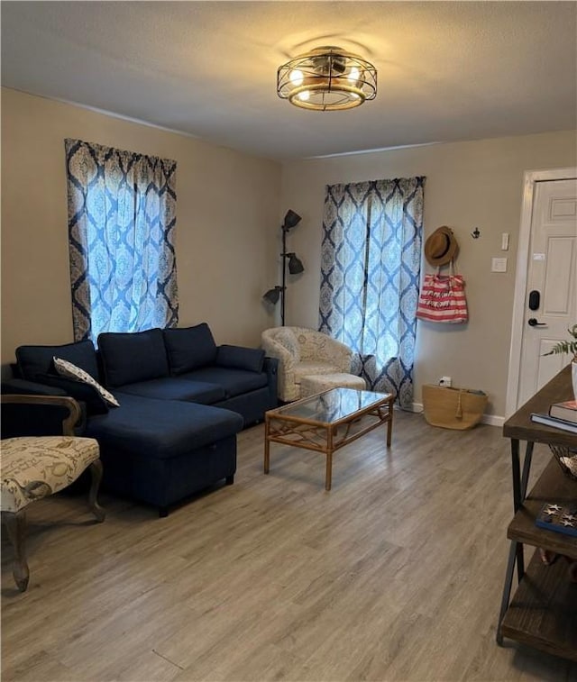 109 S Verne St, Rockport, TX 78382 - living area featuring light wood finished floors and baseboards