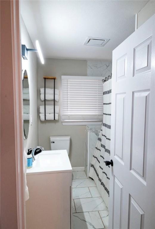 109 S Verne St, Rockport, TX 78382 - full bathroom featuring marble finish floors, vanity, and a shower with shower curtain