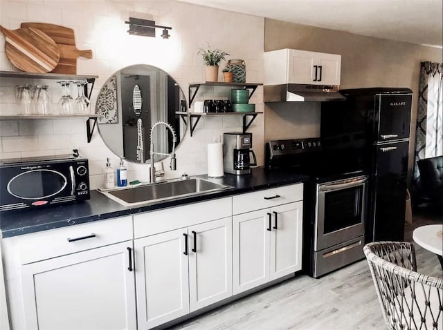 109 S Verne St, Rockport, TX 78382 - kitchen featuring open shelves, stainless steel range with electric stovetop, under cabinet range hood, tasteful backsplash, and white cabinets