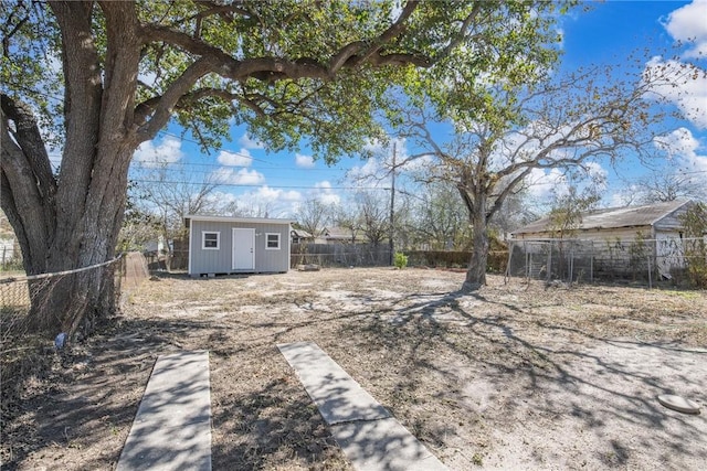 view of yard with a storage unit