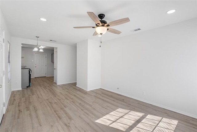 unfurnished living room with ceiling fan and light hardwood / wood-style floors