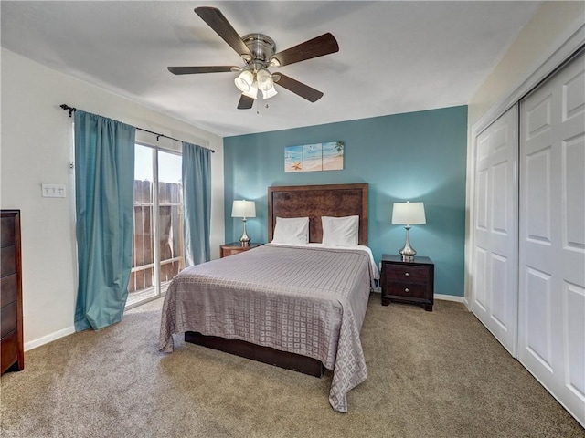 bedroom featuring a closet, carpet flooring, and baseboards