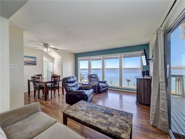 living room with ceiling fan and dark wood-style flooring